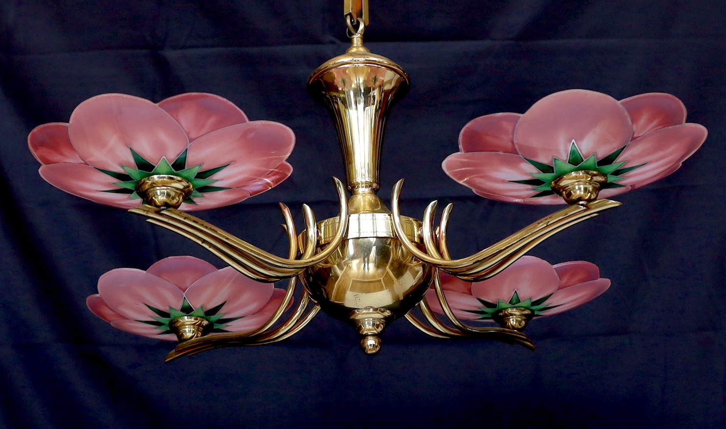 A 1930s French Leys Lurha polished brass four branch light fitting with stylised lotus flower pink glass shades, height 70cm. width 70cm